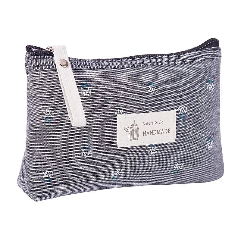 Pochette beauté compacte en toile – plusieurs motifs — vue 8