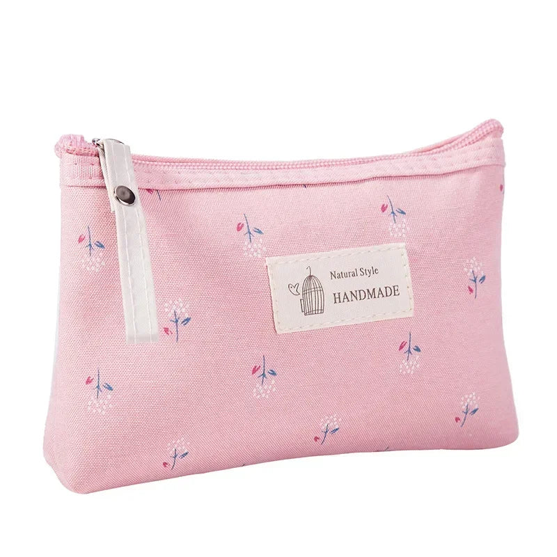 Pochette beauté compacte en toile – plusieurs motifs — vue 9